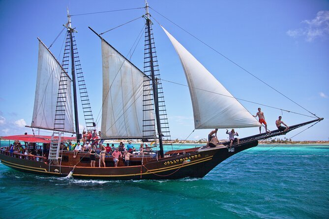 Set sail on Aruba’s Jolly Pirate Cruise! Snorkel vibrant reefs, explore the SS Antilla shipwreck, enjoy a BBQ lunch, and sip drinks from the open bar.